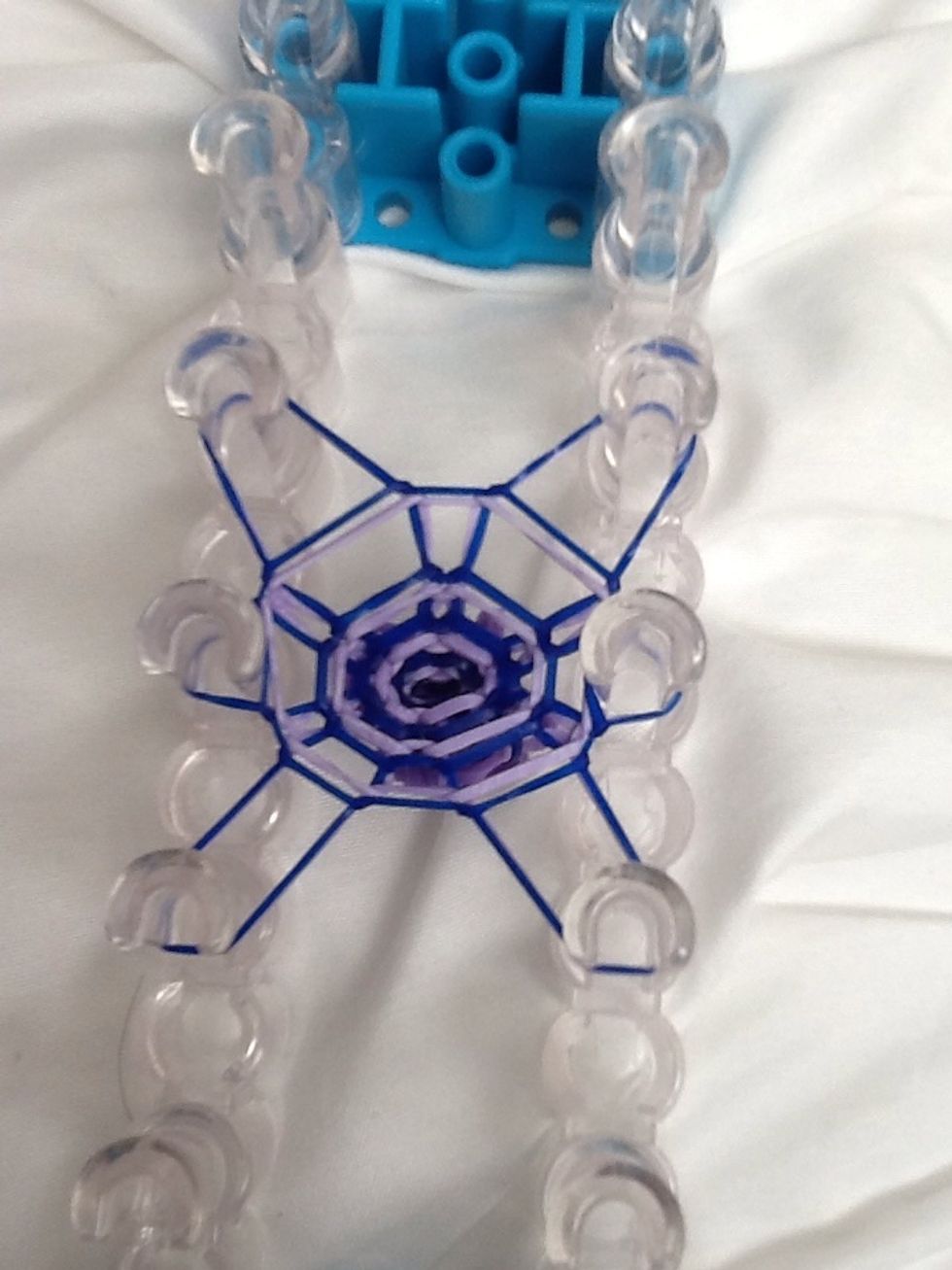 Keep pulling the bottom of the bracelet to make it stretchier and longer