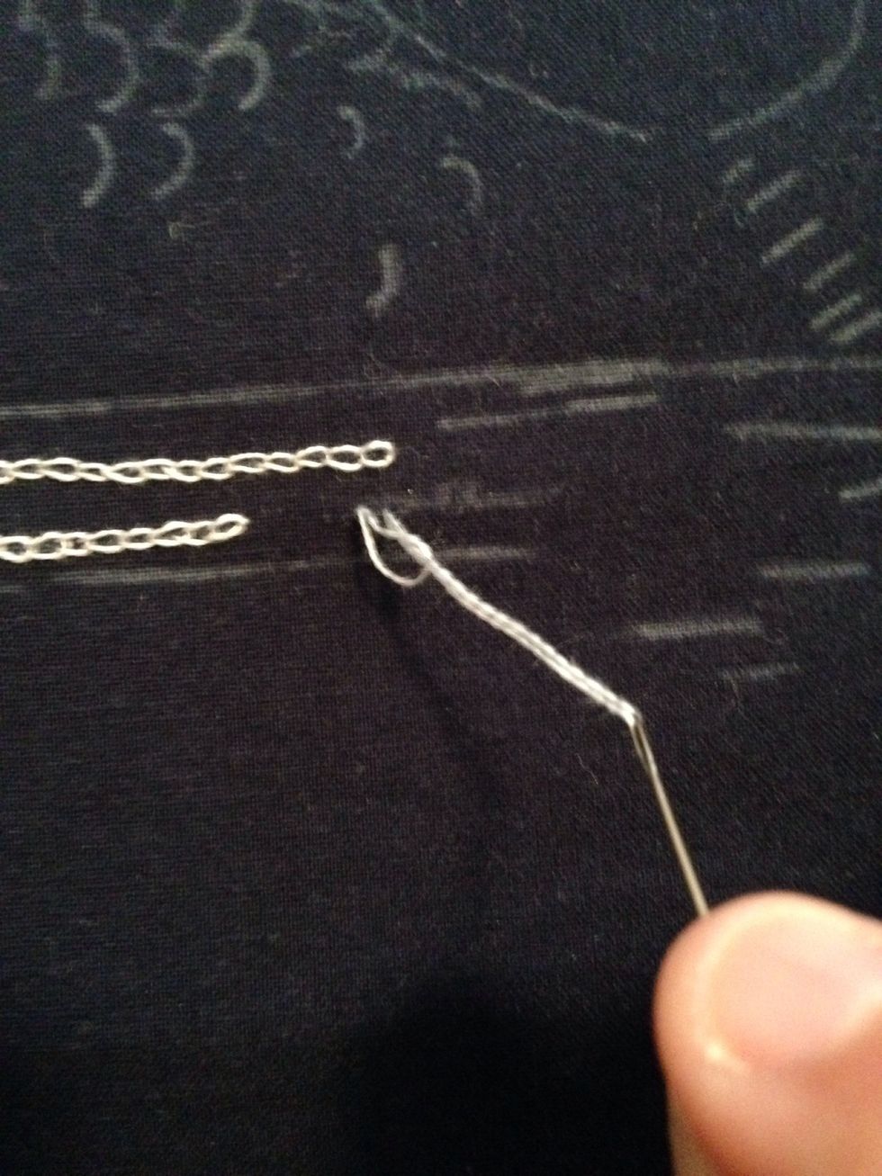 Keep pulling your thread through the loop until you reach the end of the thread but do not tighten the stitch too much.