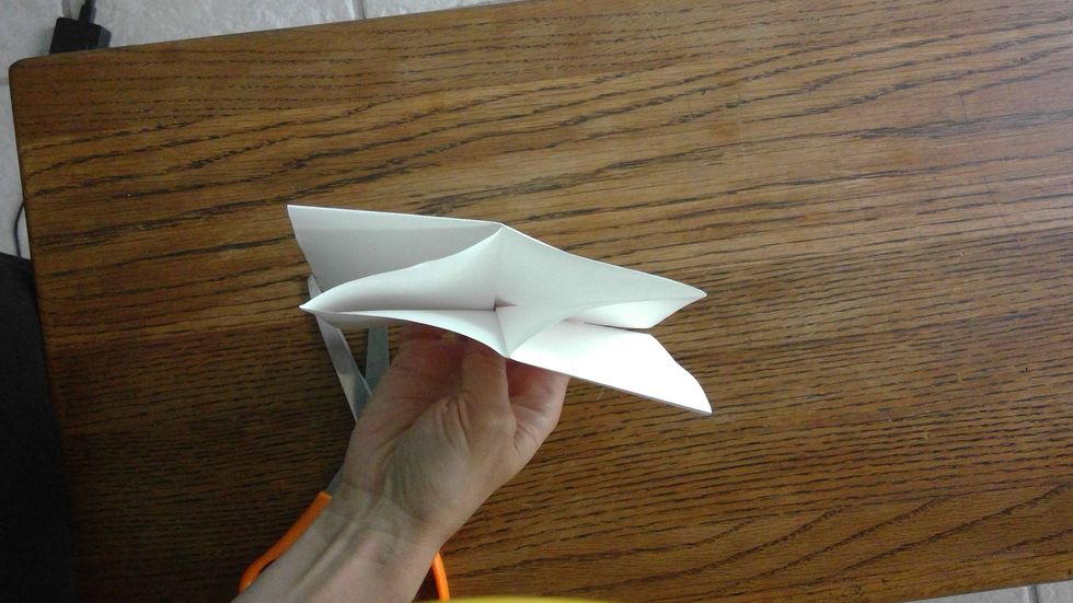 Keep pushing the sides over until they come together in the middle.