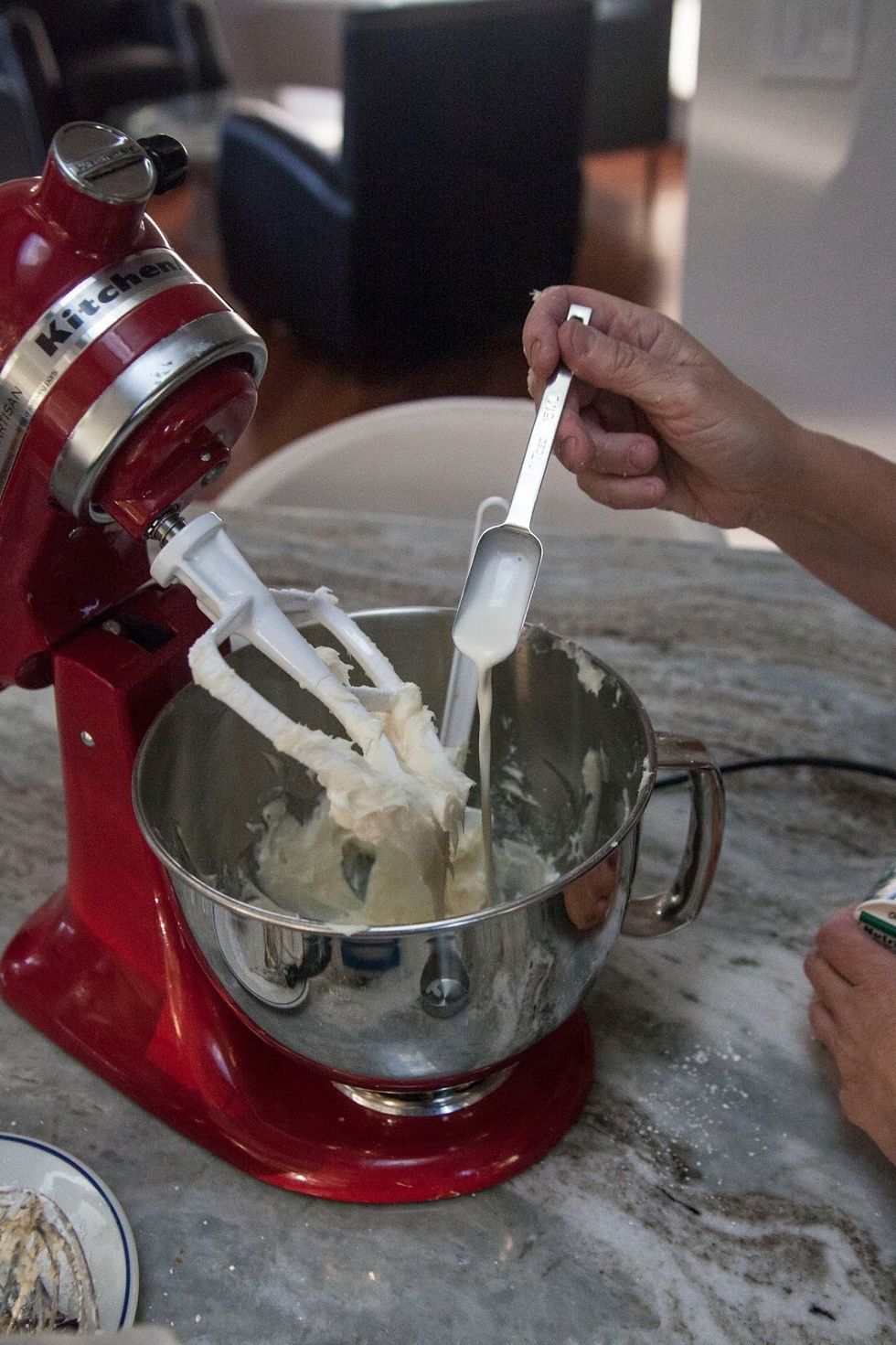 Keep scraping down the sides of the bowl, then add in the whipping cream 1 Tbs at a time until it looks right for frosting. I used 4 Tbs