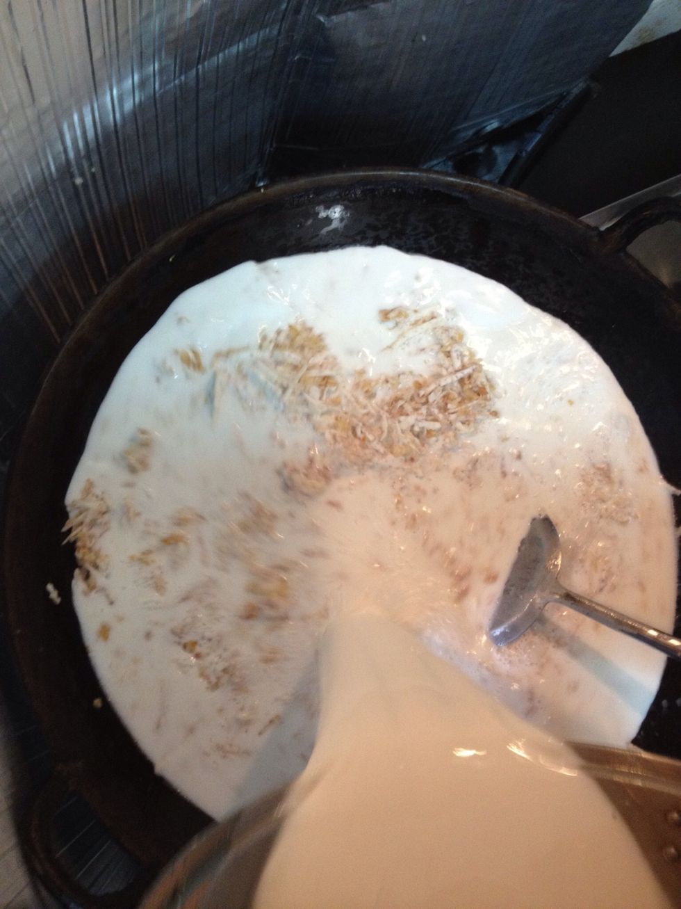 Keep stirring as mixture fills up to wok brim. Add salt to flavour, taste.
