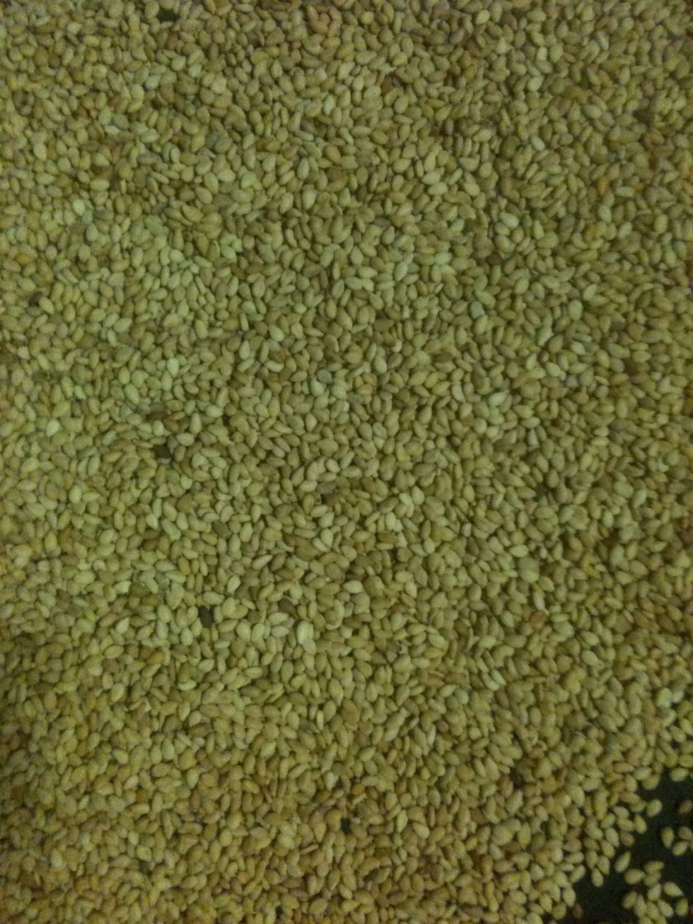 Keep stirring constantly. Eventually they'll start to pop and crackle. This means you're nearly done. Be very careful as they will very quickly go from golden brown to burnt.