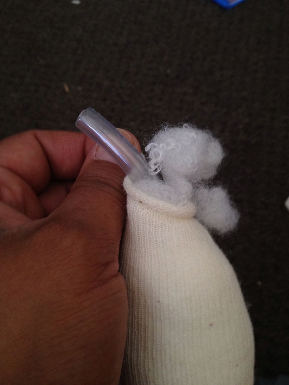 Keep stuffing till the larger tube is covered