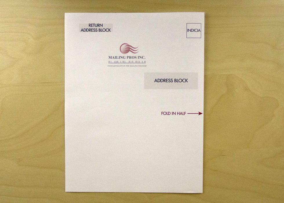 Keep the folded edge on the right-hand side.