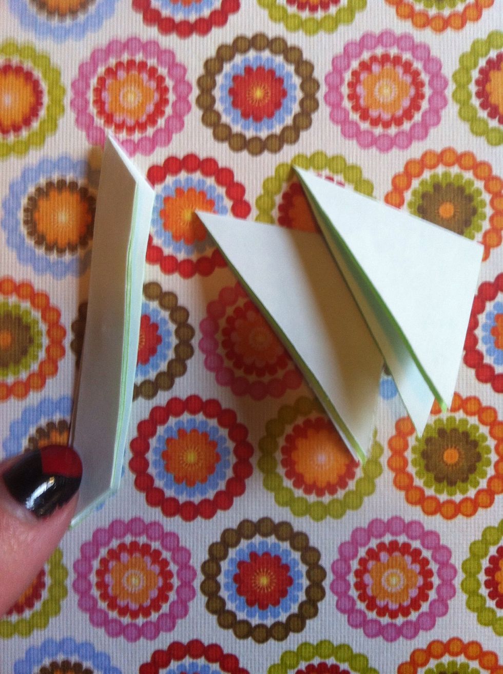 Keep the piece my finger is touching & open it all the way up...