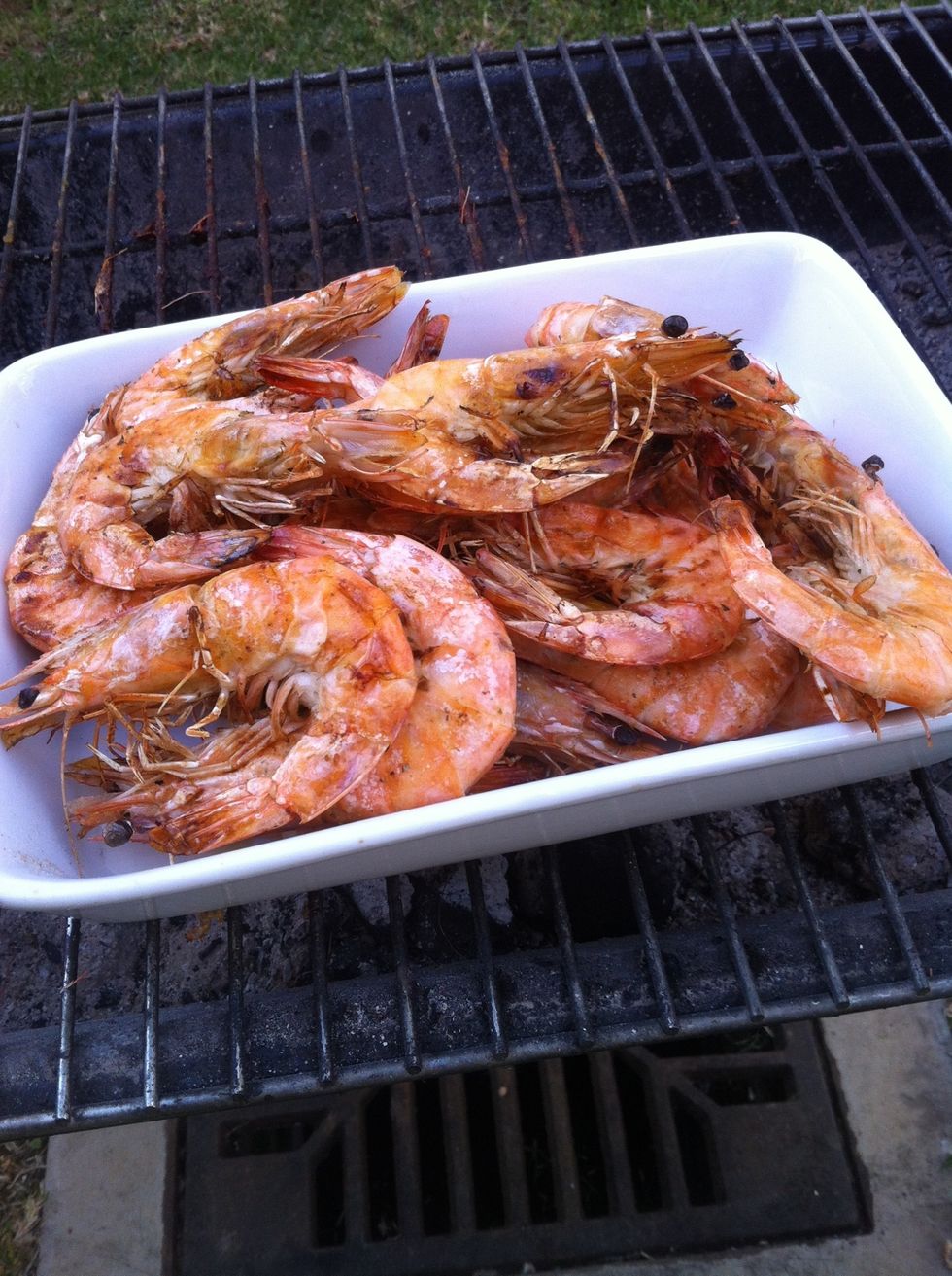 Keep the prawns warm add lemon butter and garlic butter and a touch of chilli . Done