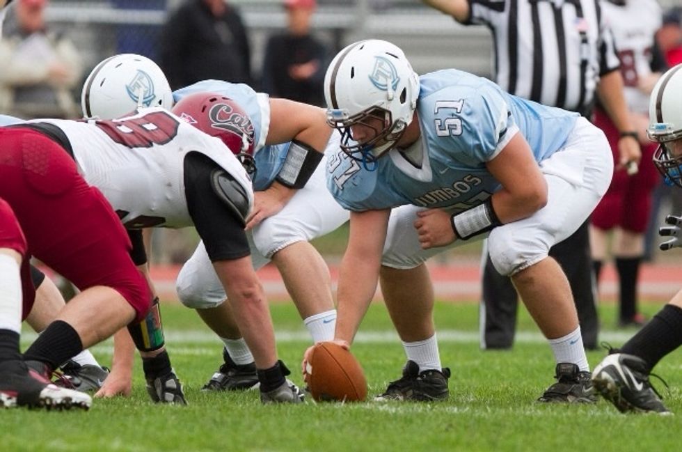 Keep your head down until the quarterback says "hike" or "go"