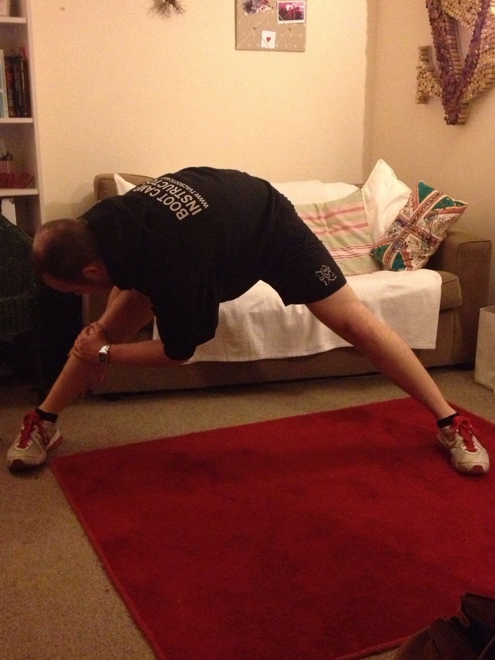 Keep your legs apart and stretch to one side leading with your chest (not with your head)