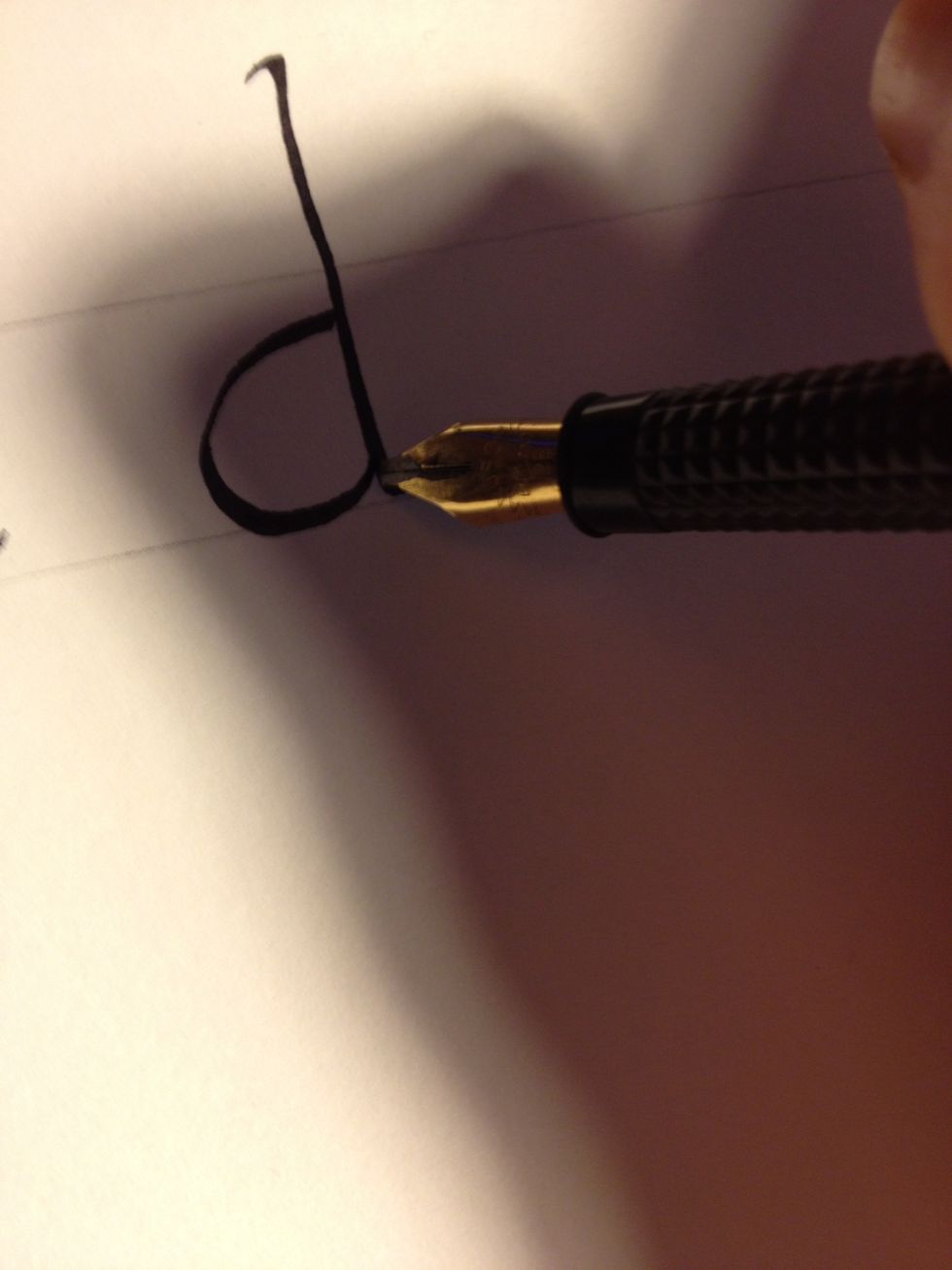 Keeping the same angle as the first stroke, start the second stroke at roughly the same height as you would for "b", then make a letter "c".