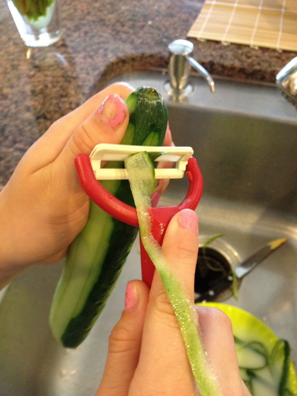 Kids can grate the cucumbers and carrots. We used the kind that's child-proof.