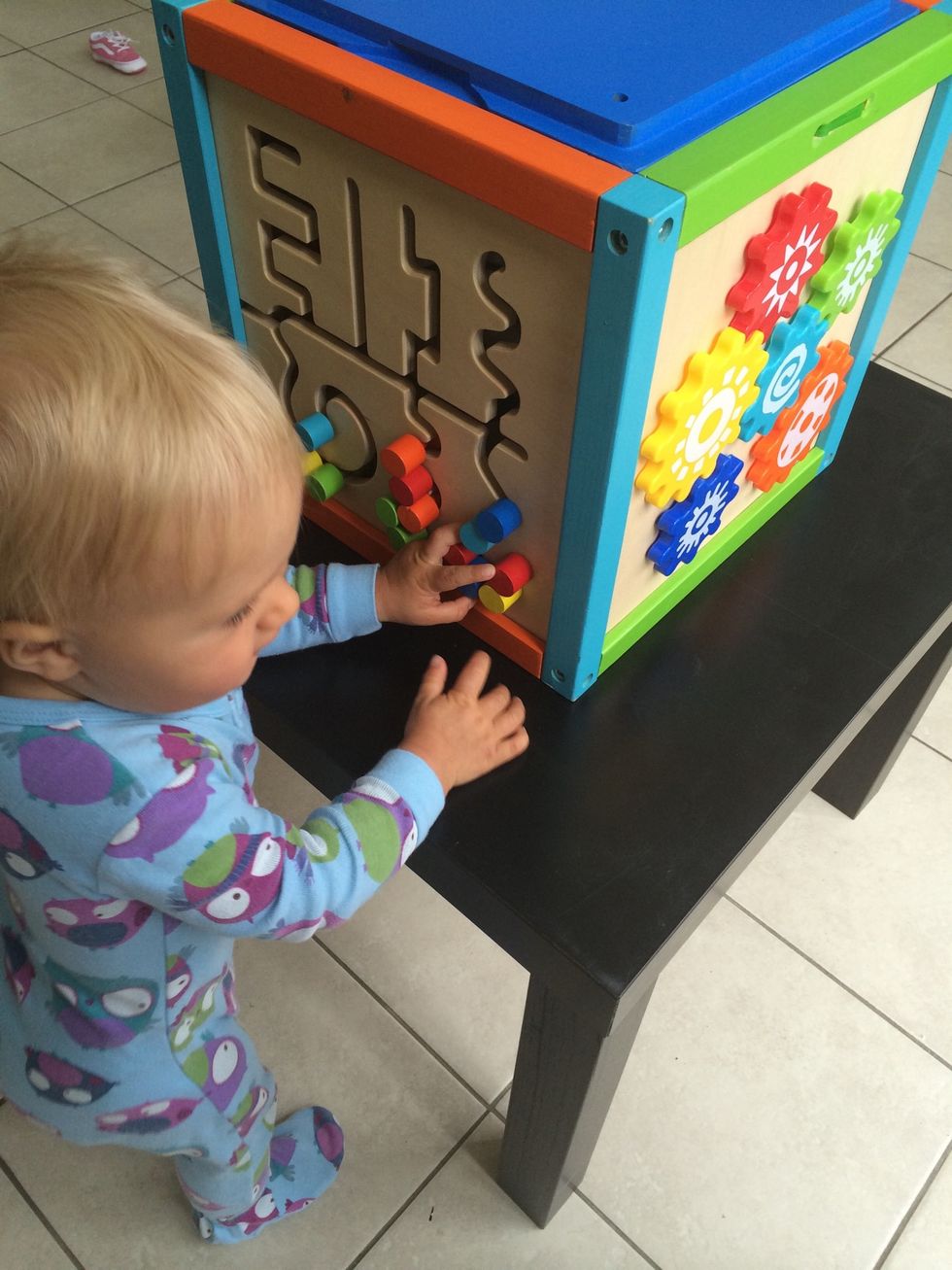 Kids love to play with these cubes but if they're on the floor for a cruiser or walking baby then they get ignored since they're too low. This is a easy way to get them up a bit higher.