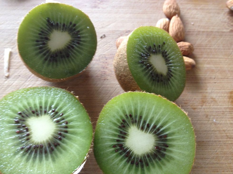 Kiwi Fruit! The seeds add some serious crunch to the salad. Use a spoon to scoop out the flesh and then slice the halves into half moon shapes.