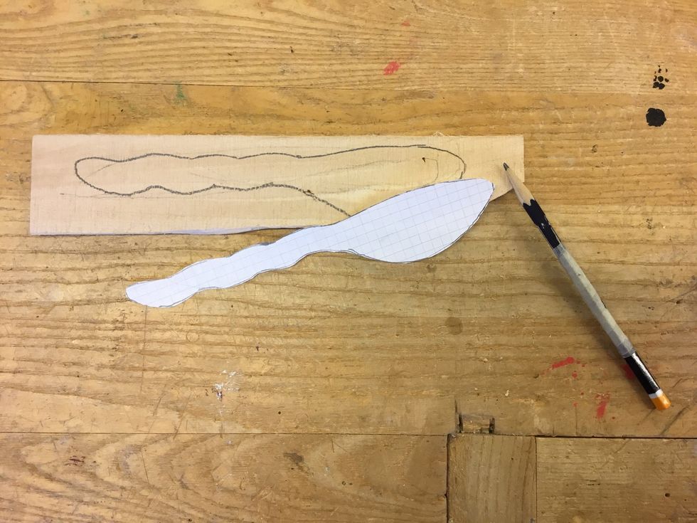 Klipp ut det f\u00f6rslaget du gillar b\u00e4st och rita av det p\u00e5 tr\u00e4biten.