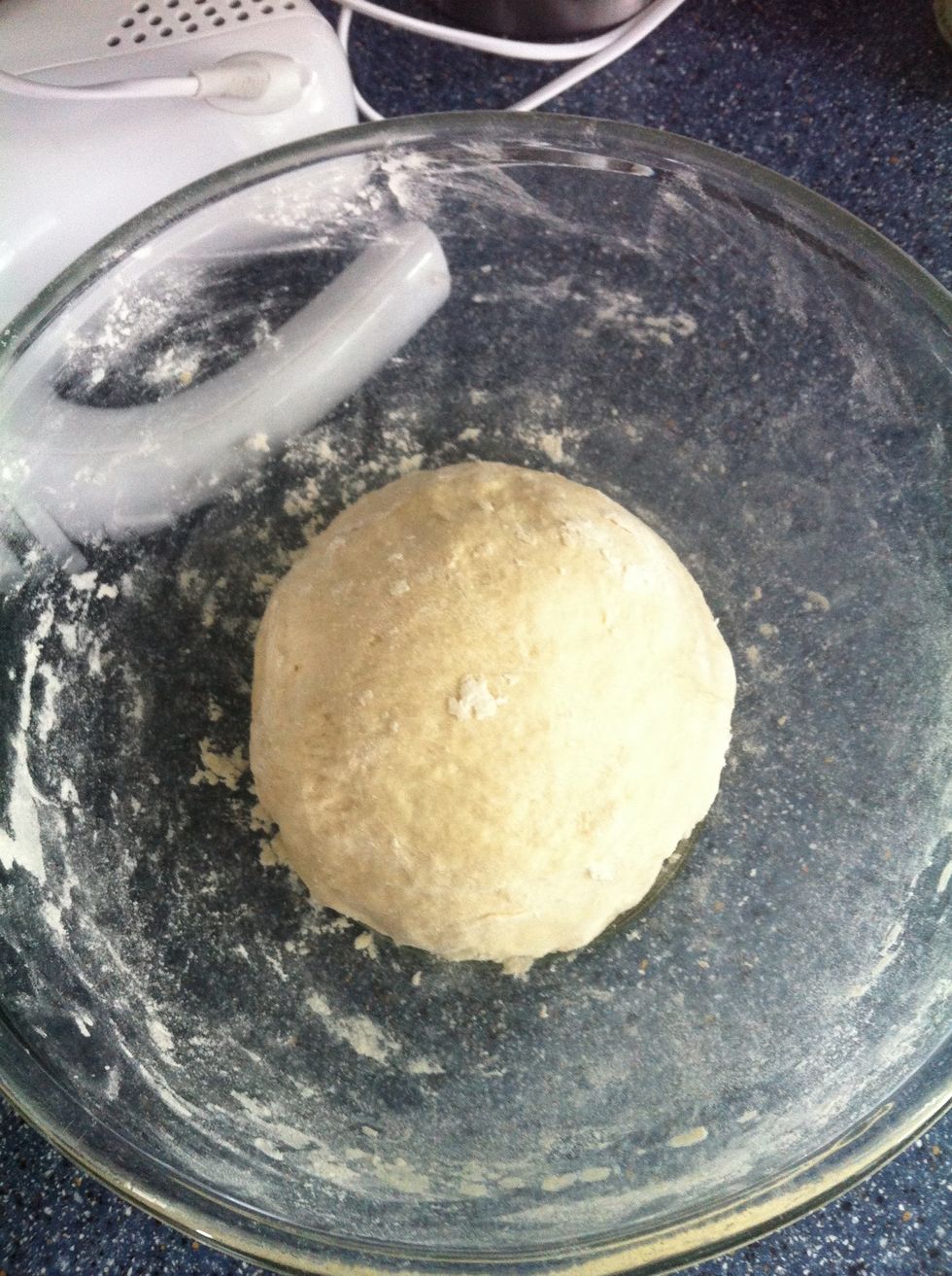Knead and form into a ball when the dough is soft and light. I kneed in the mixing bowl as it creates less mess :)