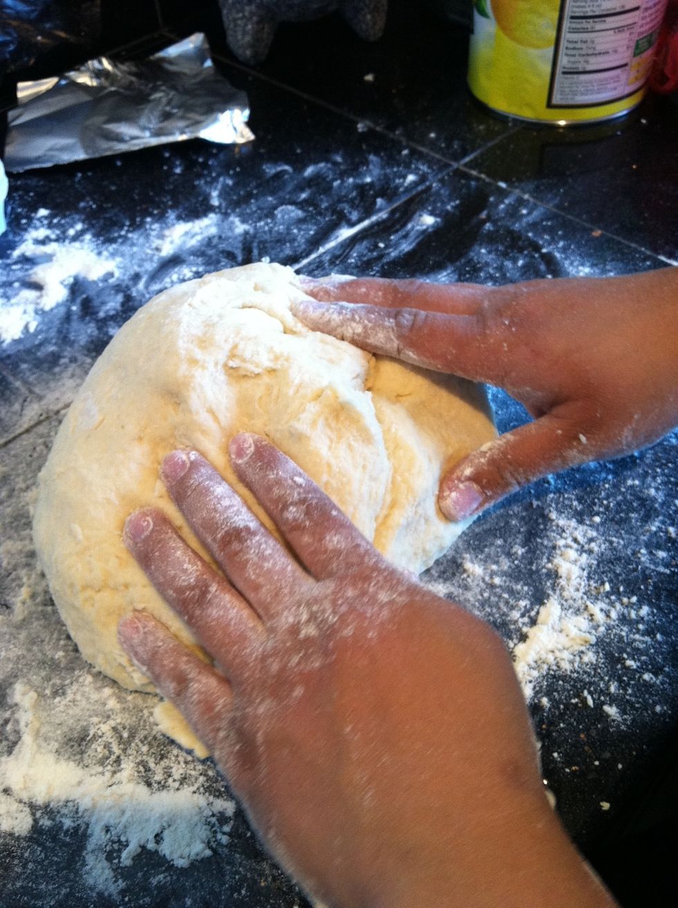 Knead dough adding more flour till dry to the touch