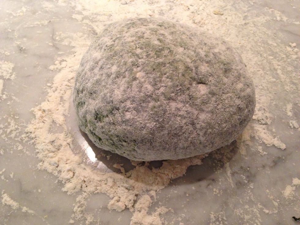 Knead the dough, adding more flour as necessary to ensure it does not stay sticky, for about ten minutes.