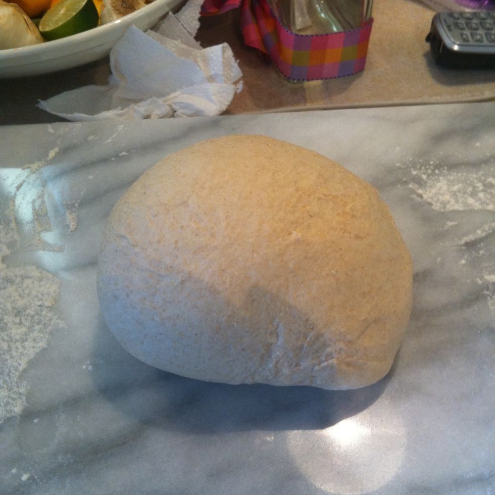 Knead the dough for a bit and form it into a big ball.