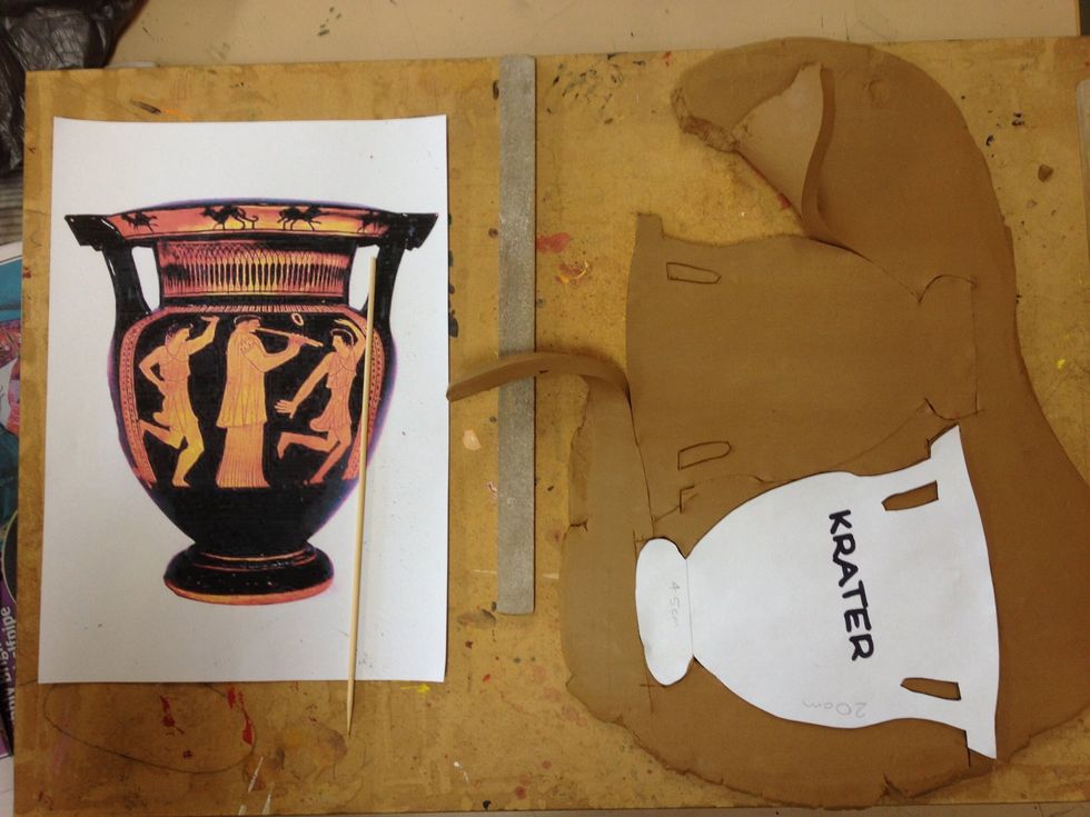 Knead your clay. Place the dowels either side of the clay and roll out a slab- ensure the roller covers the dowels as well as the clay to create an even depth. Cut out two side templates