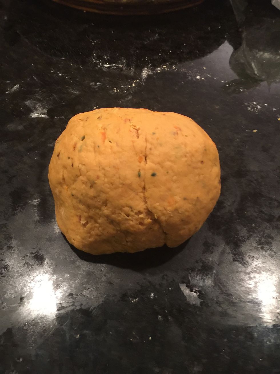 Kneed and pack the dough into a ball.