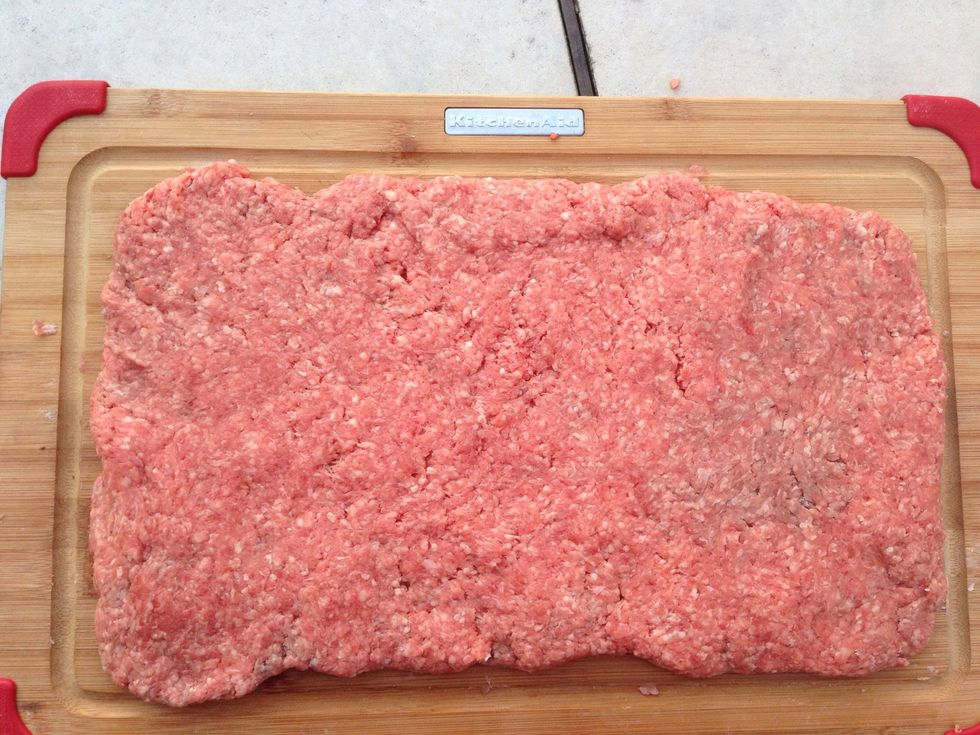 Kneed the ground chuck and flatten it out into a rectangle.