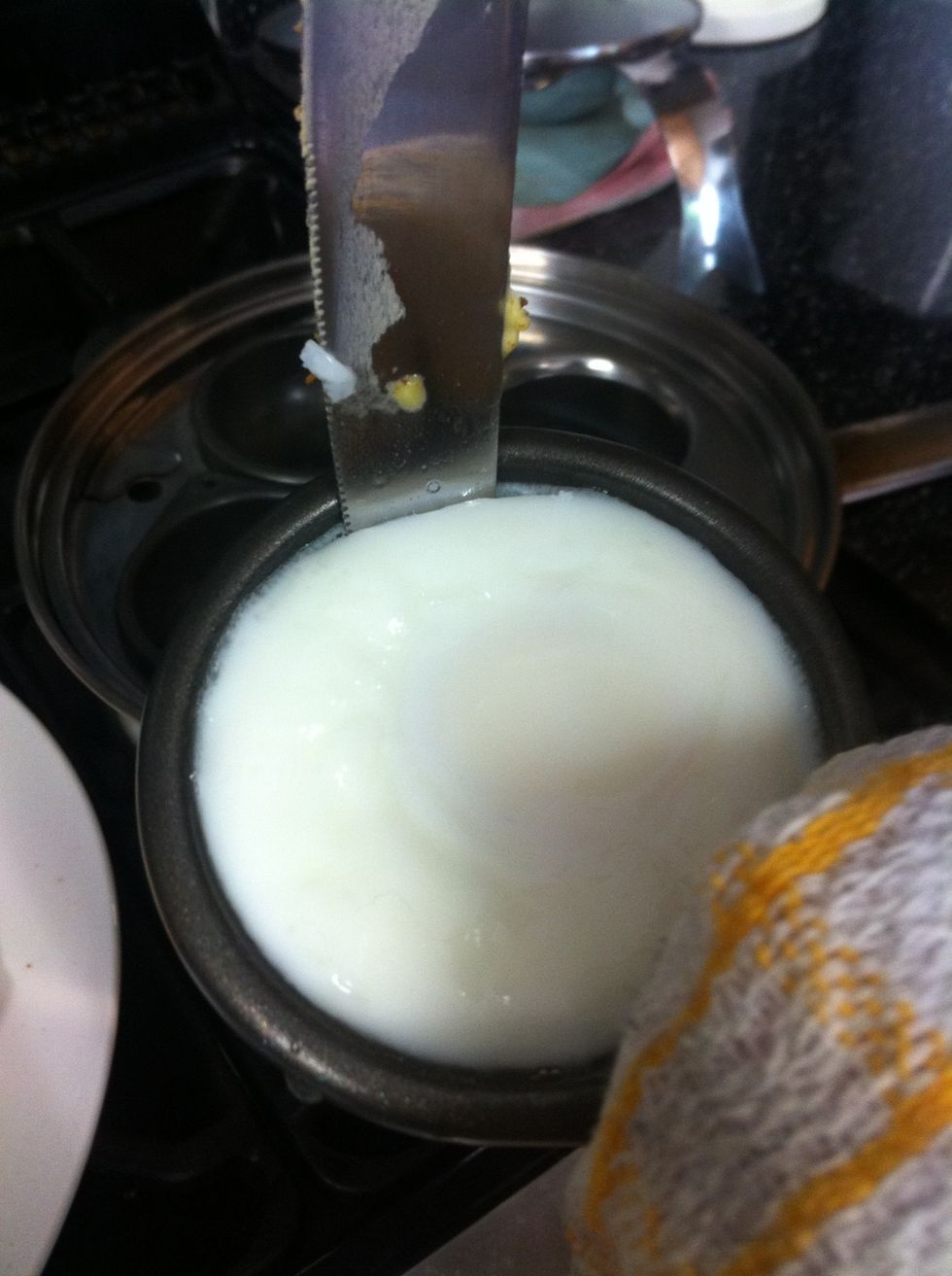 Knife around the whole of the edge of the egg and tip it onto toast
