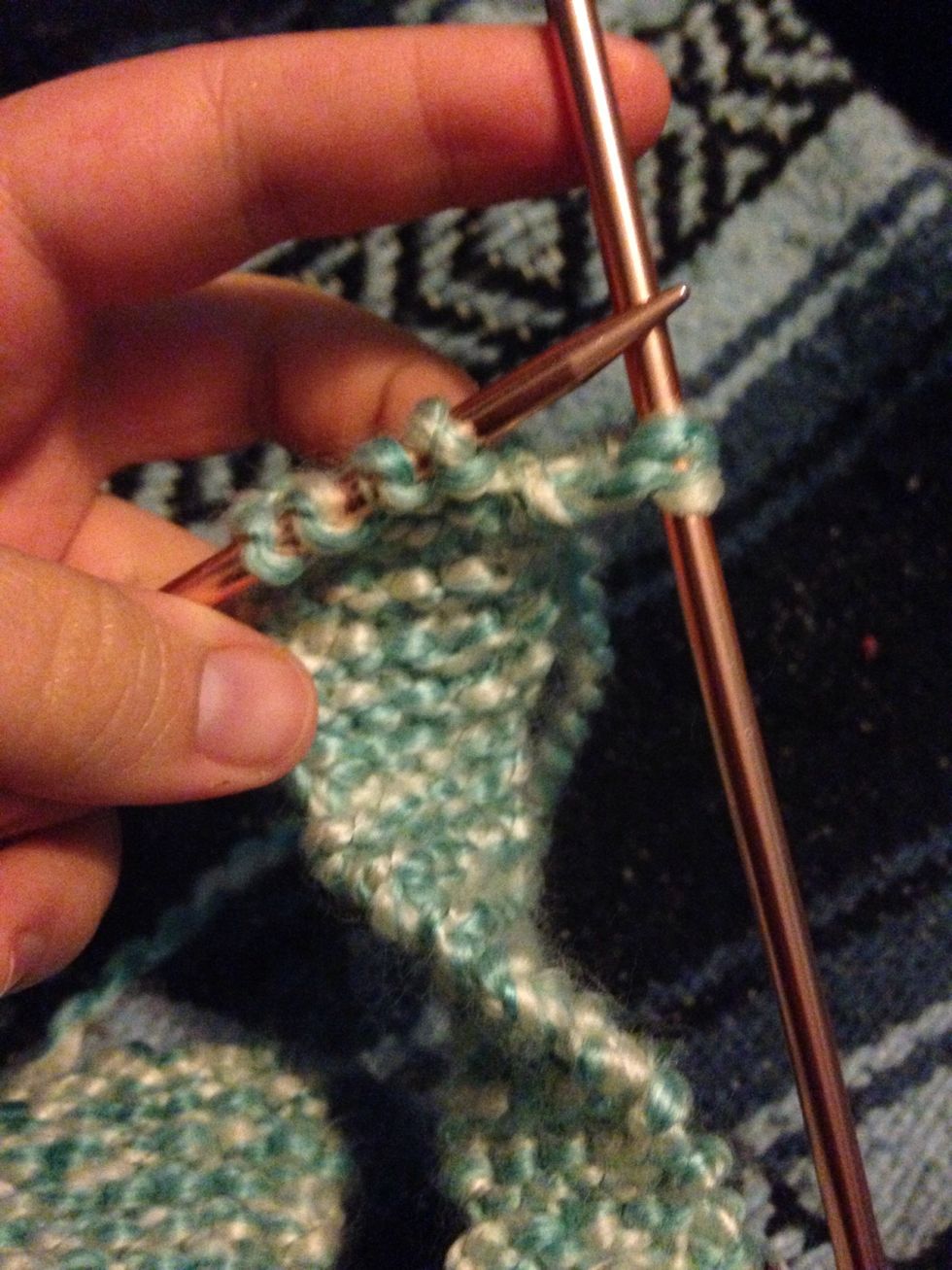 Knit the next row normally, then every second row do the same technique until you are back at 10 stitches