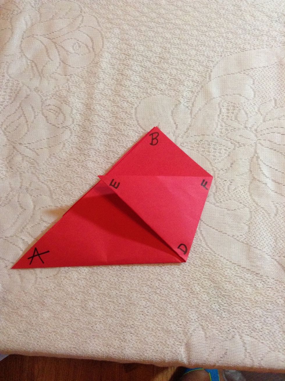 Label the bottom point of the new triangle D. From left to right, label the top two corners of the triangle E, F.