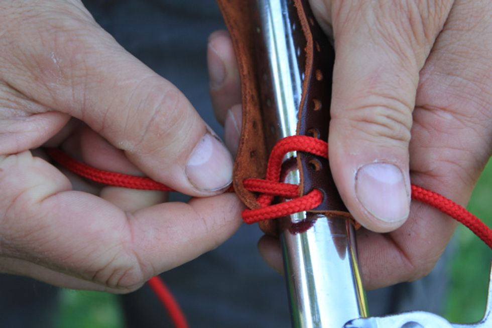 Lacing:  Take one lace and thread it through the next hole on the opposite side from inside to outside.