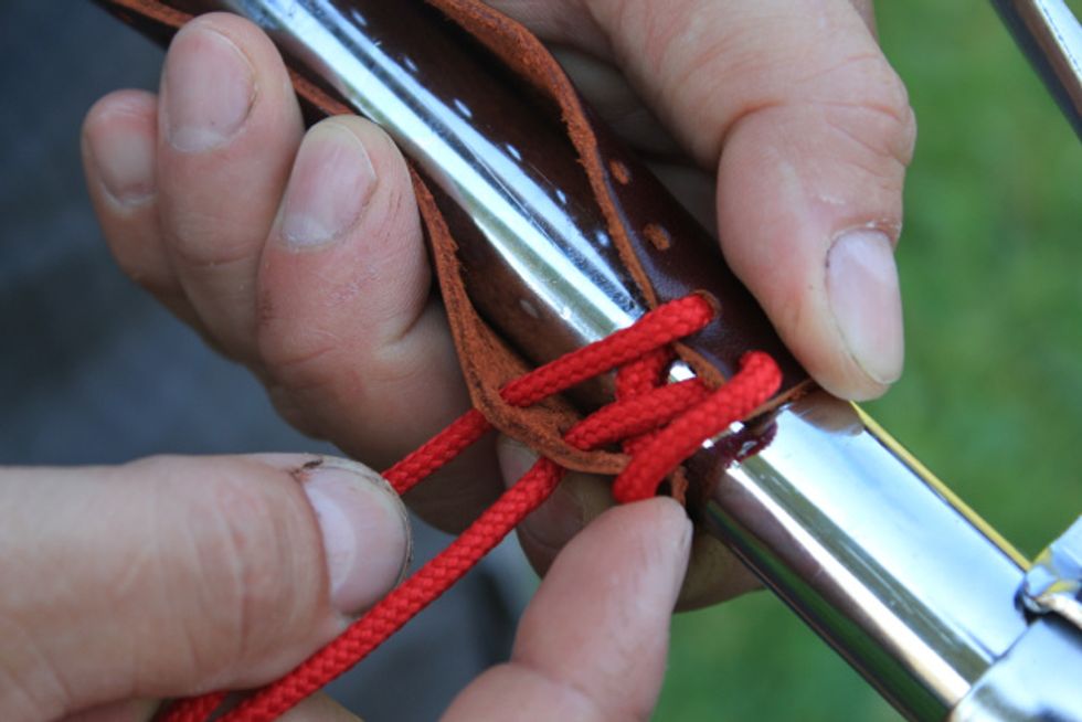 Lacing: Take the other lace and thread it through the next hole on the opposite side from inside to outside. Continue with the same lace to the next (third) hole on the opposite side (in- to outside)