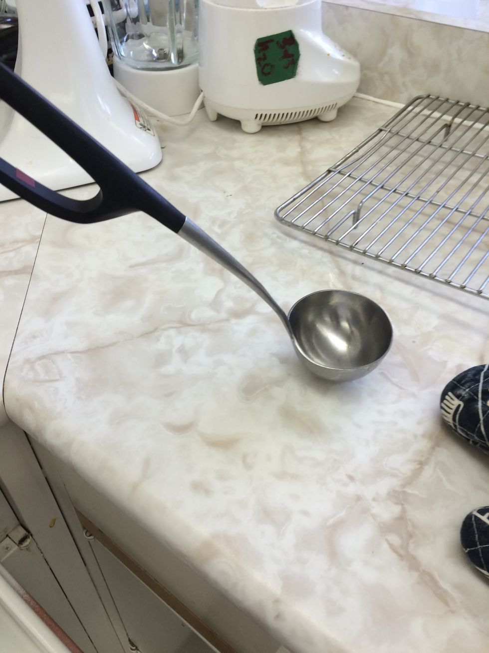 Ladle: Can be used to scoop soup, sauce, etc. I can put soup in a bowl with a ladle.
