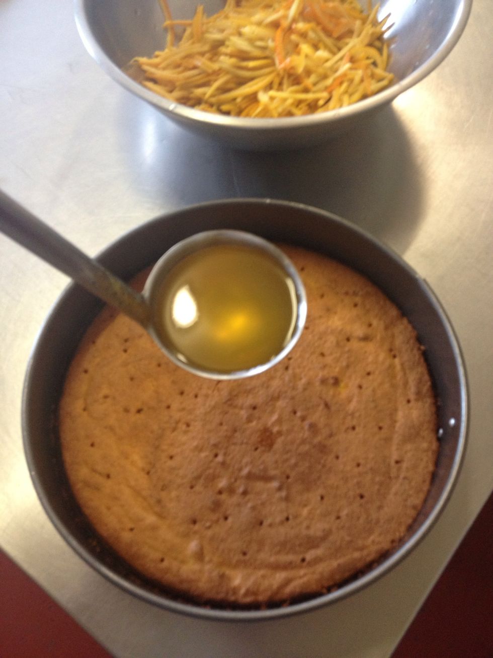 Ladle over some orange syrup. I was also making marmalade and used some of that as it was reducing. You can use a jar of marmalade with some water to loosen it in the microwave
