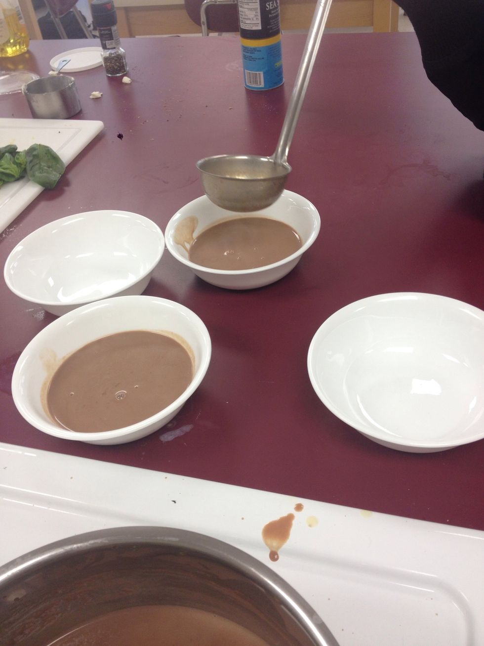 Ladle the soup into warm bowls