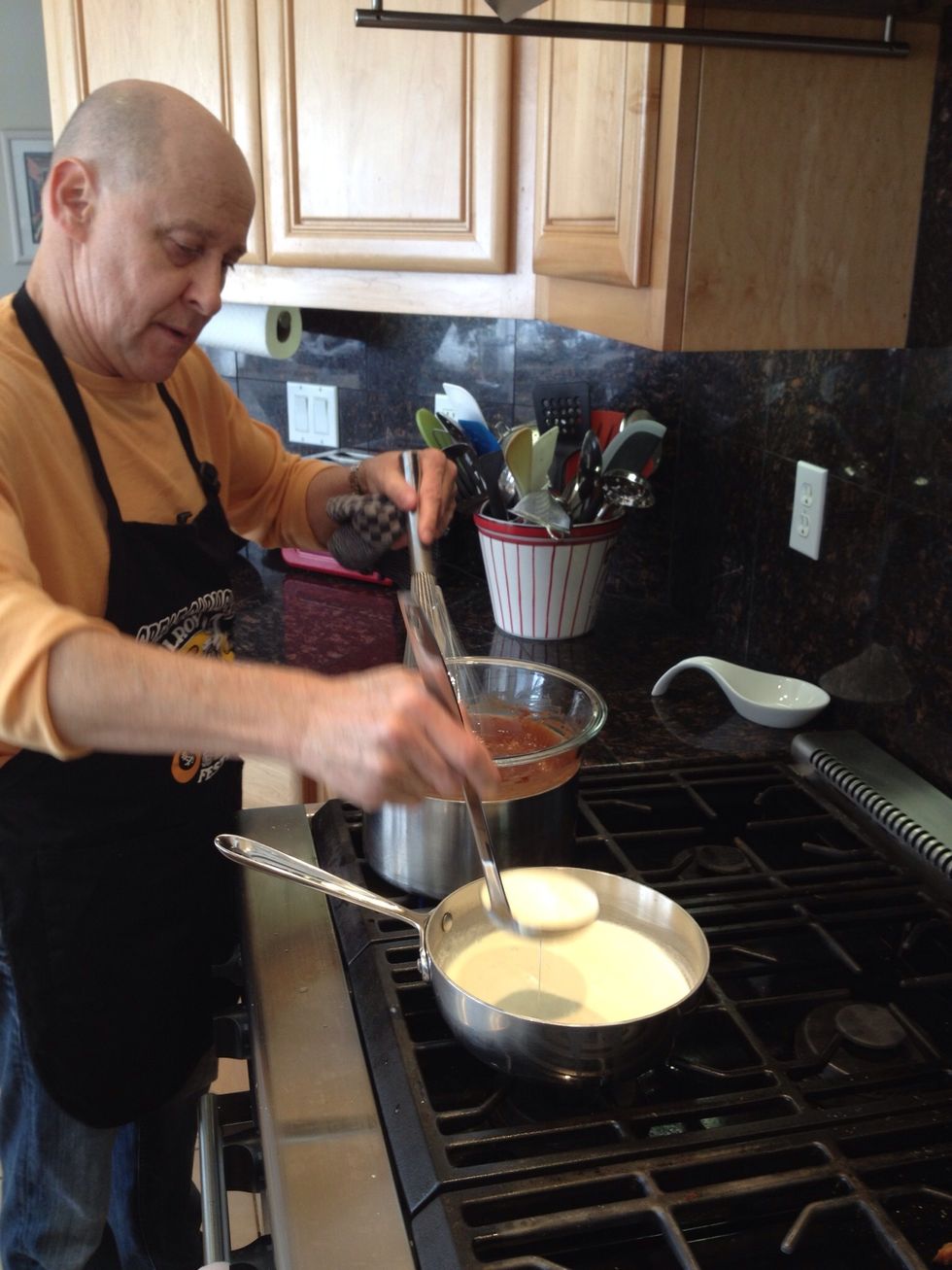 Ladle the warm milk and cream into the chocolate, tasting occasionally to make sure the mixture is to your liking.