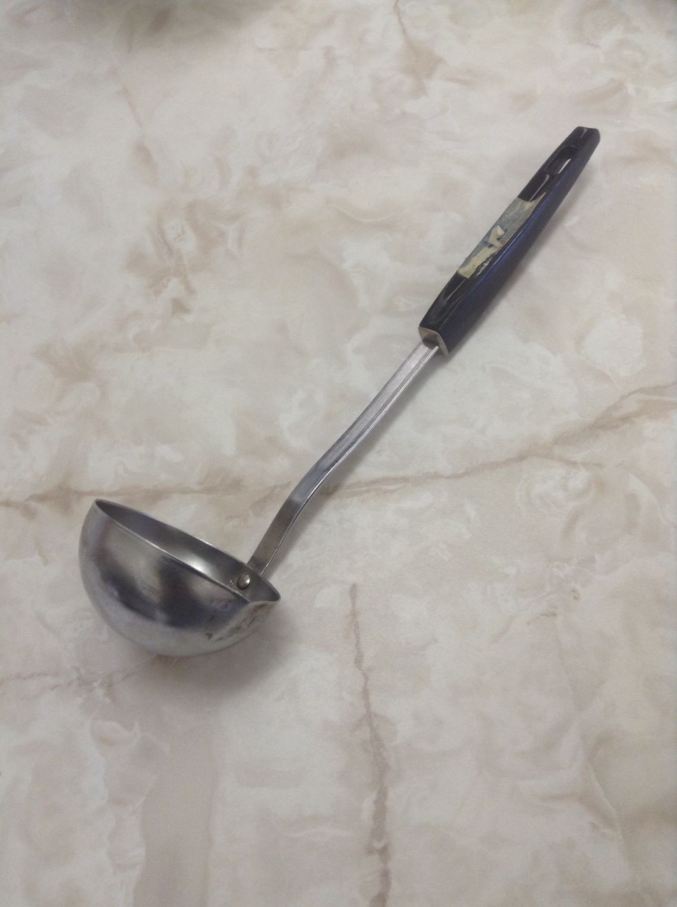 Ladle. Used to scoop soup and other liquids. I can use a ladle to serve soup.