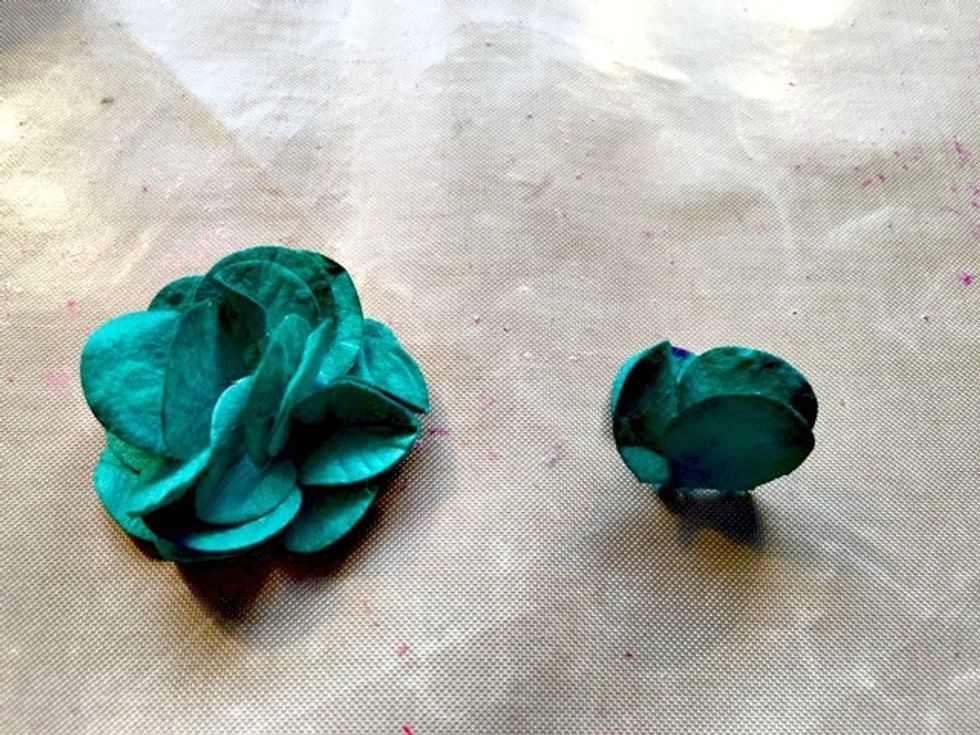 Last bloom take all petals and scrunch together and glue to the center... Very easy and I finaly used some of these old muberry flowers that I've had forever !