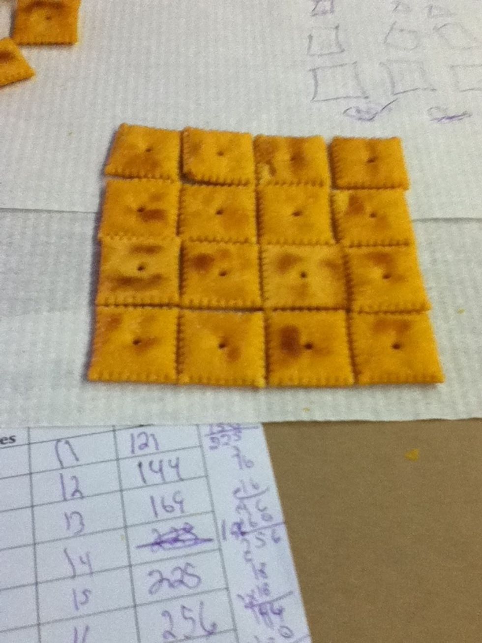 Last I added 4 more cheese nips  to the length. I added one more row to the width. Now I have four on the length and four on the width.