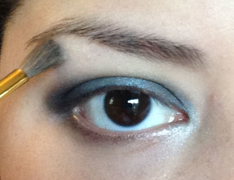 Last I am taking the shade Sandstone (a light matte beige color) and applying it to my browbone.