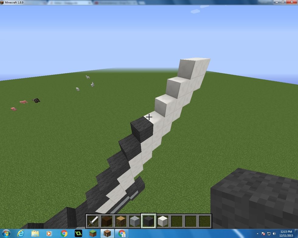 Last of all cover all the outside in Grey Wool Blocks.