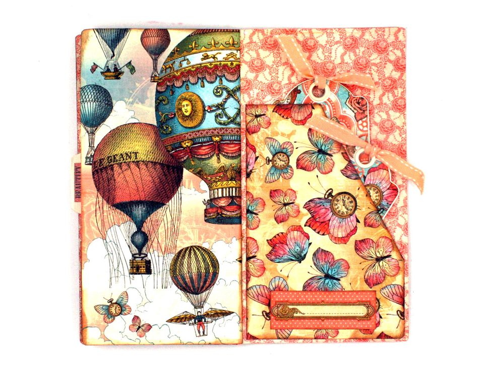 Last page inside: Cut  4 1/8 x 6" pc from Spread Your Wings &  cut diagonally as in the photo.  Form a pocket by gluing on the left & bottom edges.