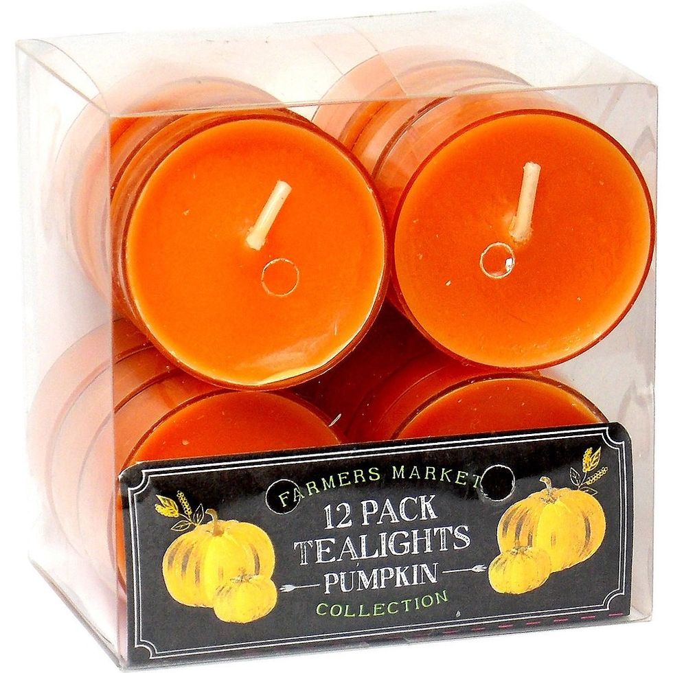 Last put the candle in the pumpkin and put the top back on.