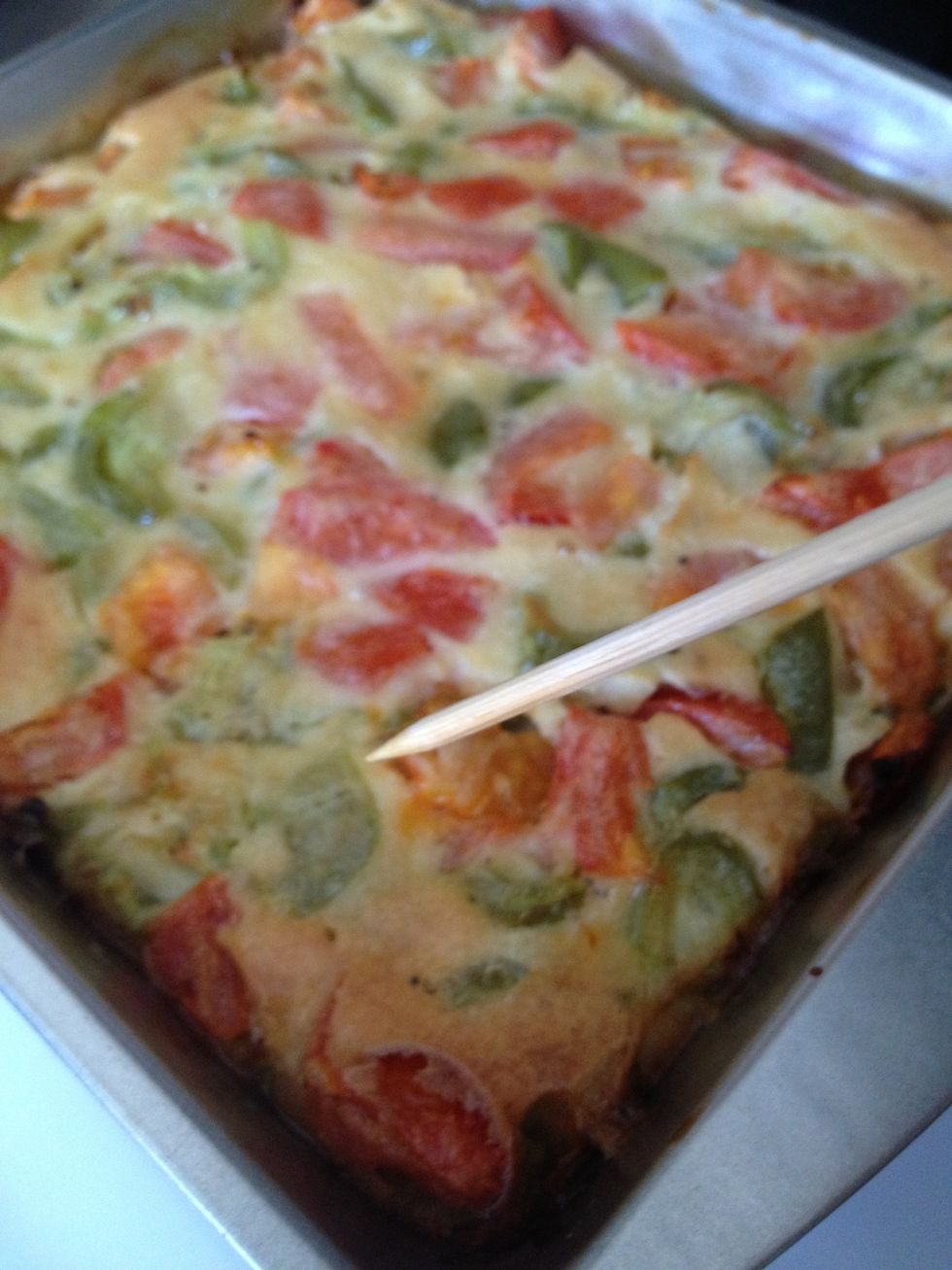 Last step is to test omelette with wooden toothpick (pierce it through from top to bottom and remove it) \u2013 if it does come out clean \u2013 baked omelette is ready.