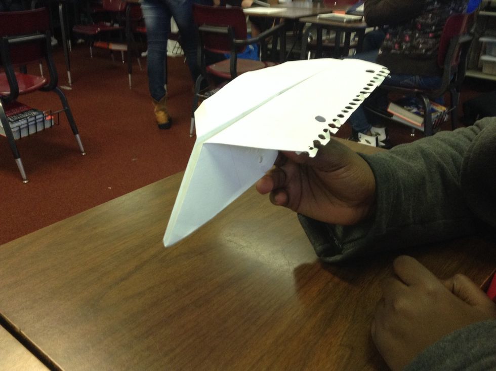 Last you open your paper planes wings , and their you go