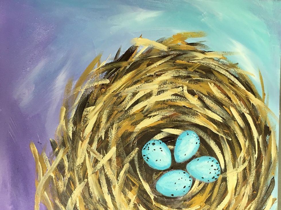 Lastly, add a few dark brown speckles of various sizes on the eggs.