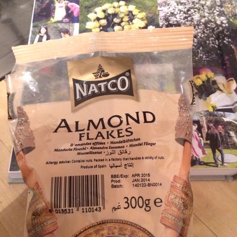 Lastly add some flaked almonds to decorate the top off your cake