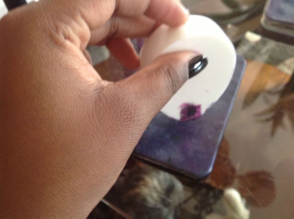 Lastly add white and dab lightly on a few sections in.  Around those sections with the nail polish brush dot the case, wait a few seconds then dab the blobs with the sponge. (this makes the stars)