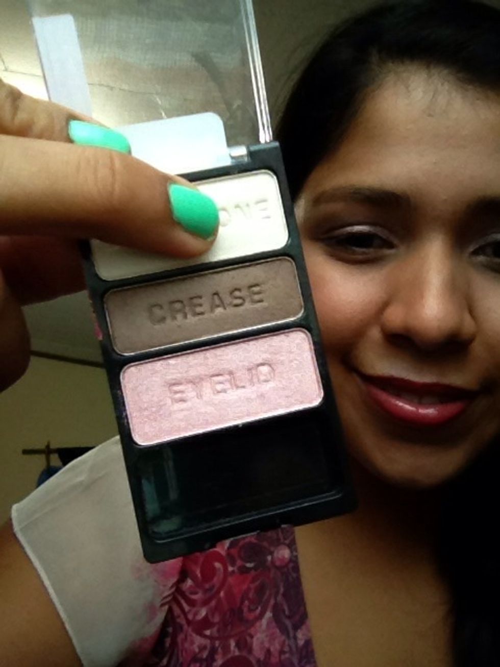 Lastly apply the shimmery white eyeshadow onto the browbone.