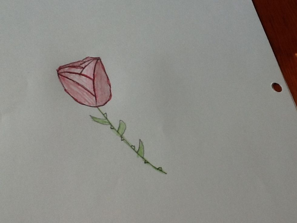 Lastly color and decorate your rose any way you want, I like to outline the rose with red pen