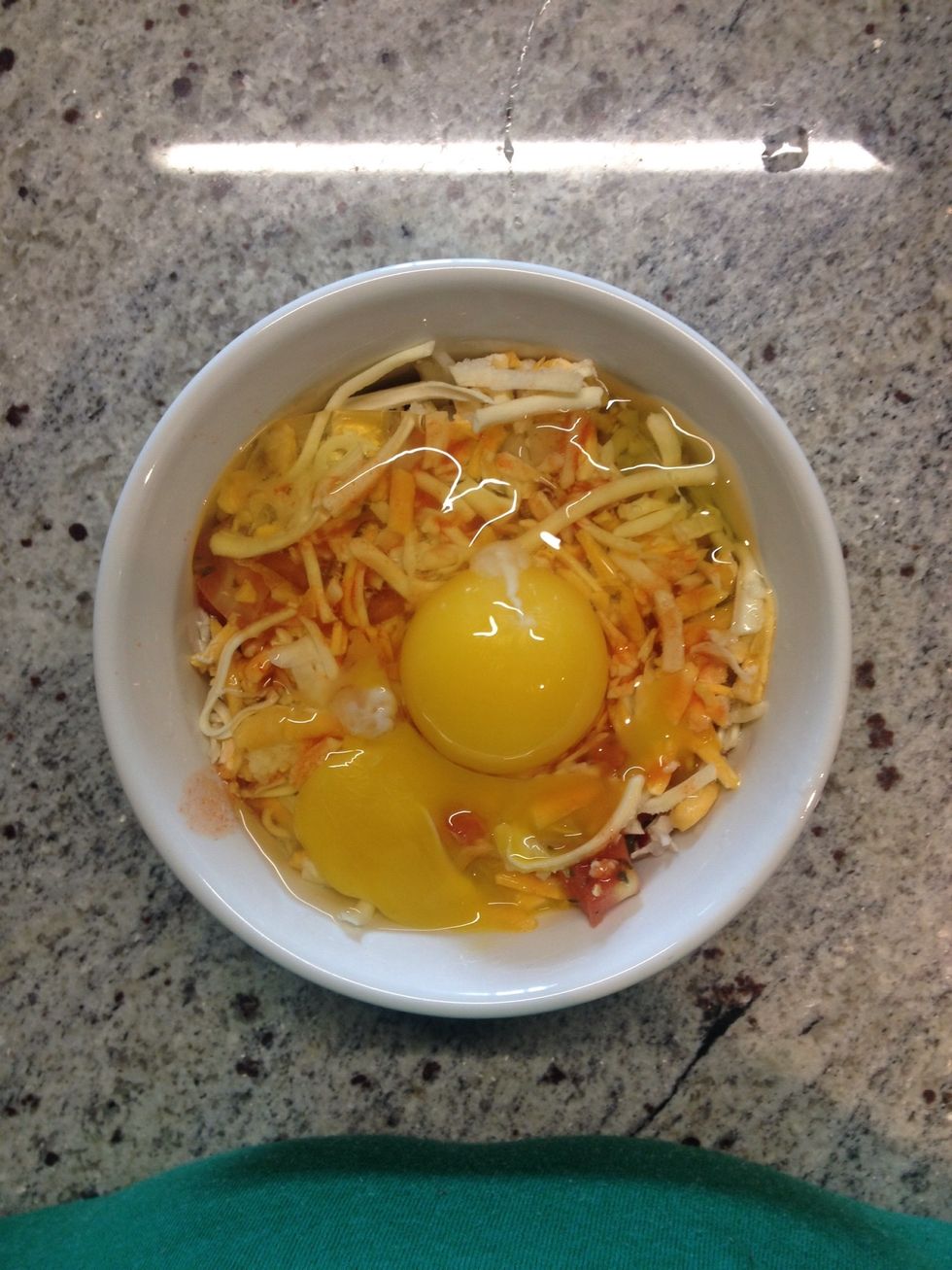 Lastly, crack your eggs overtop of of the layered dish and add a pinch of s+p. Pop it in the oven for about 15min (or until the whites are cooked through).