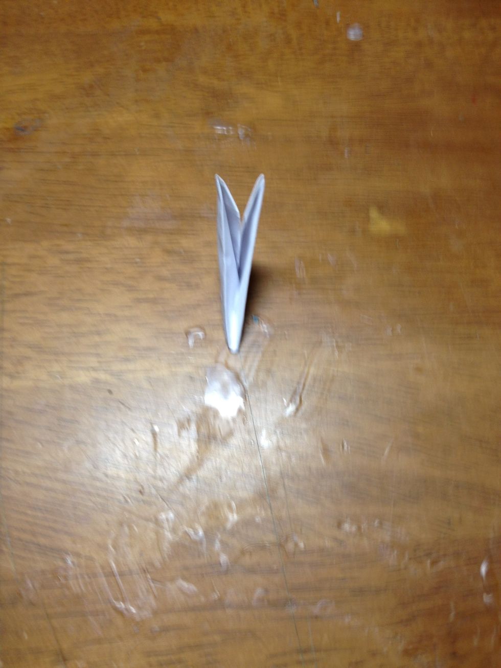 Lastly, fold the piece in half along the center line and your piece should look like the pic above.