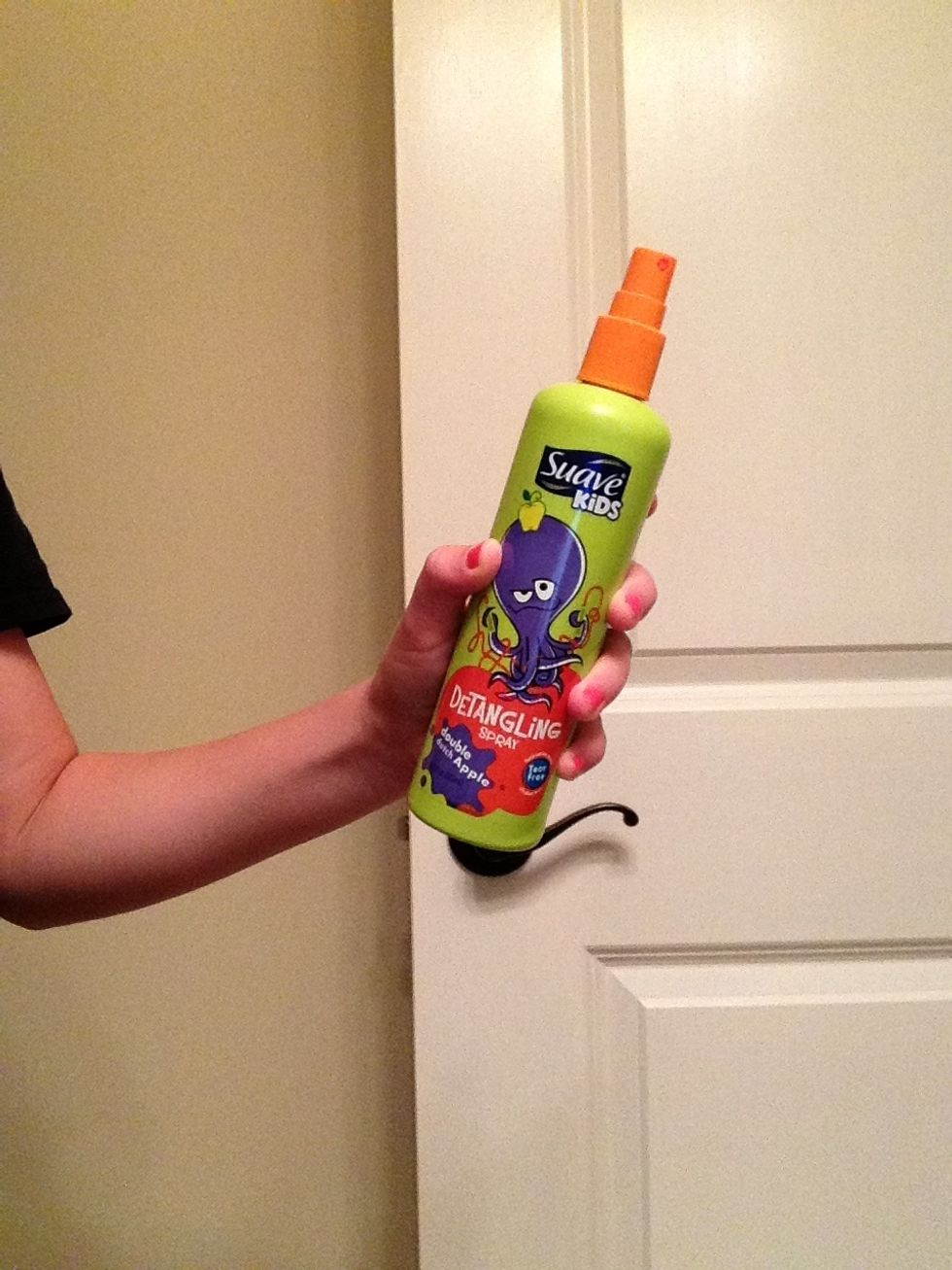 Lastly, I pull my hair up into a very low ponytail and apply some of my homemade conditioning mist.